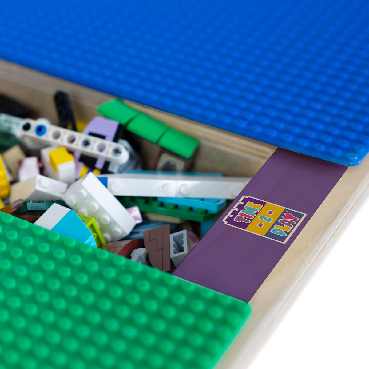 Square Time-2-Play Table with a trough and shelf, along with adjustable 12"-18" legs with locking casters and a LEGO® Compatible Grid of BLUE/GREEN Color