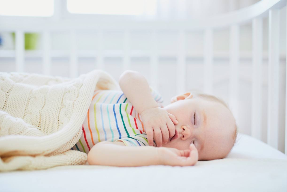 infant-sleeping-in-a-new-cot.jpg